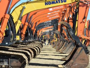 Excavators were lined up in a row last week as bidders checked out the Ritchie Bros. heavy equipment auction.